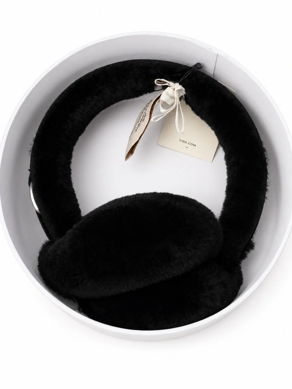 UGG Black faux fur earmuffs.